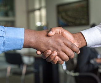 two people shaking hands