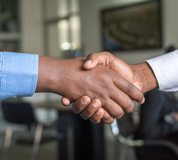 two people shaking hands