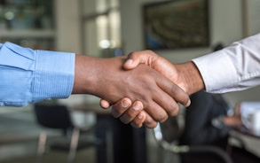 two people shaking hands