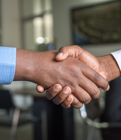 two people shaking hands