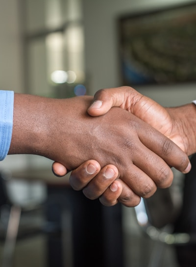 two people shaking hands