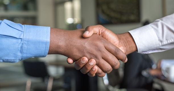 two people shaking hands