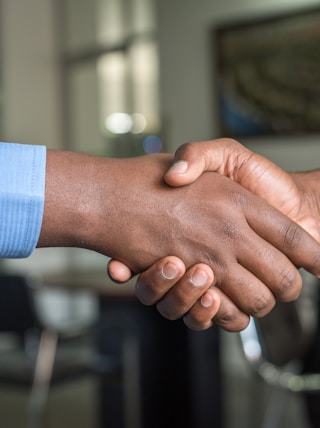 two people shaking hands