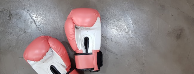 pair of pink boxing gloves