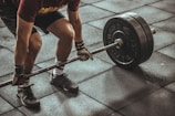 person weightlifting painting