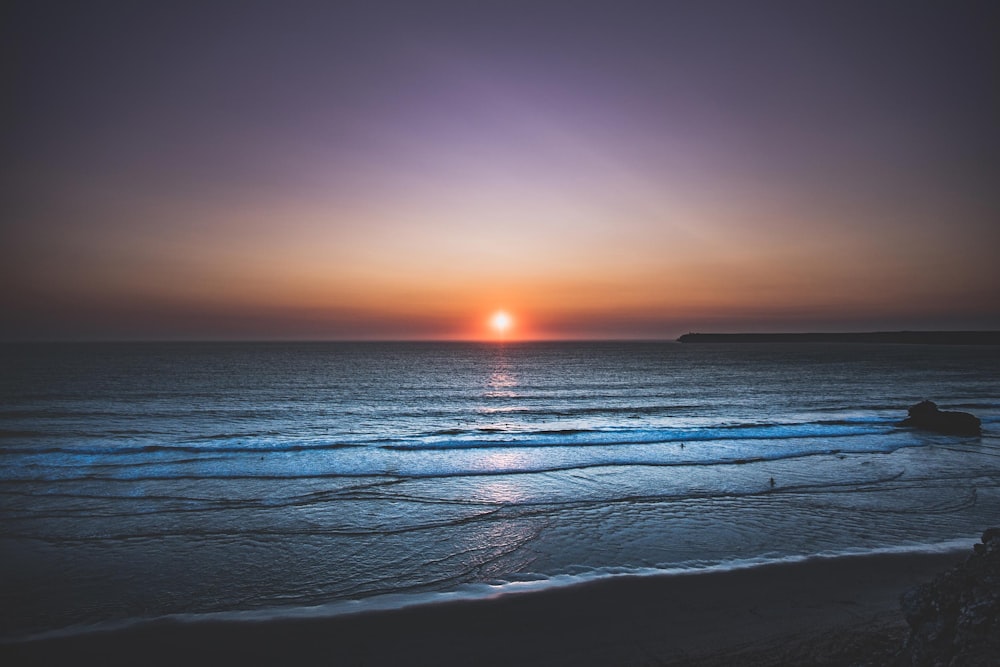 Foto de la puesta de sol en la playa