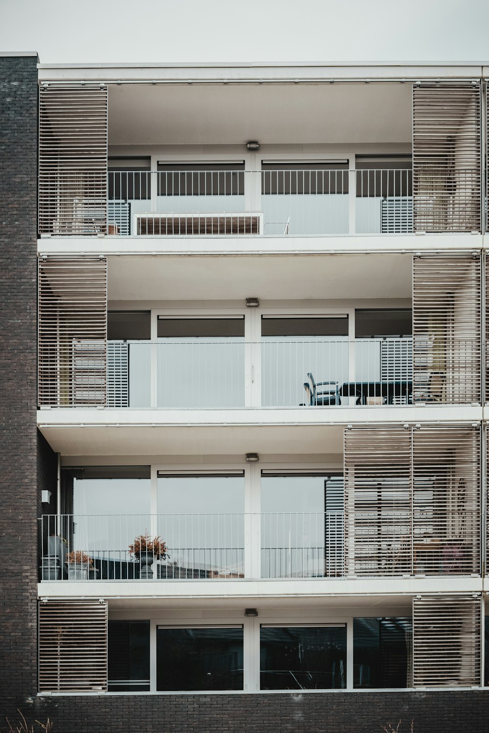 white concrete 4-story house