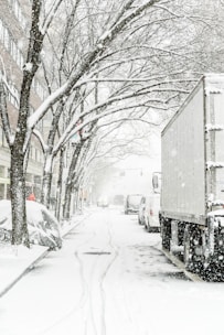 gray truck on snowy road