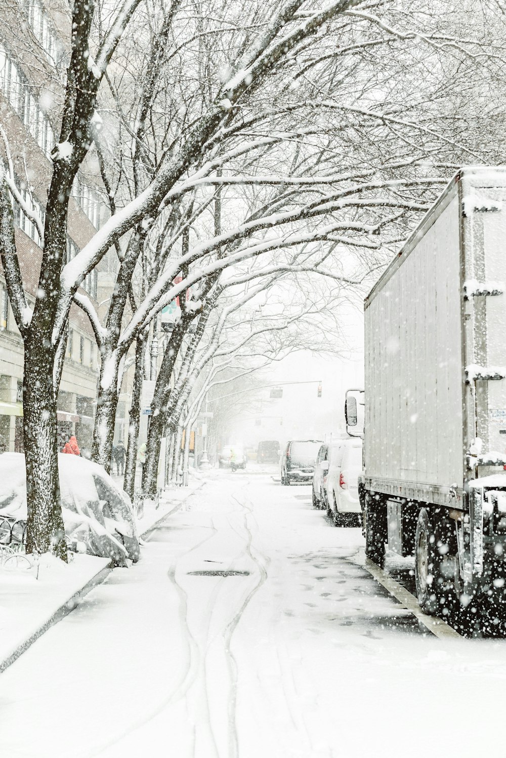 gray truck on snowy road