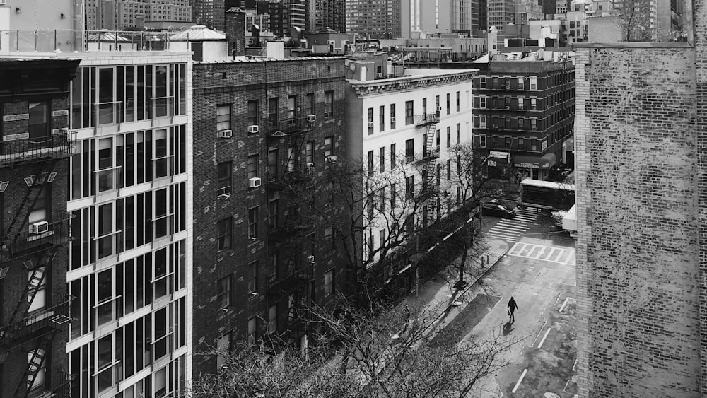 grayscale photo of high-rise buildings