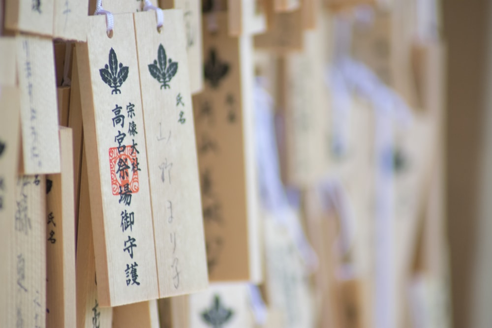 selective focus photography of two wooden block decors