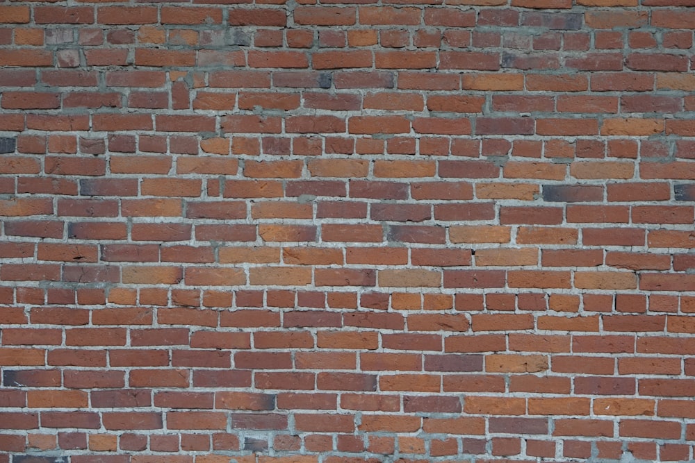 view of red brick wall