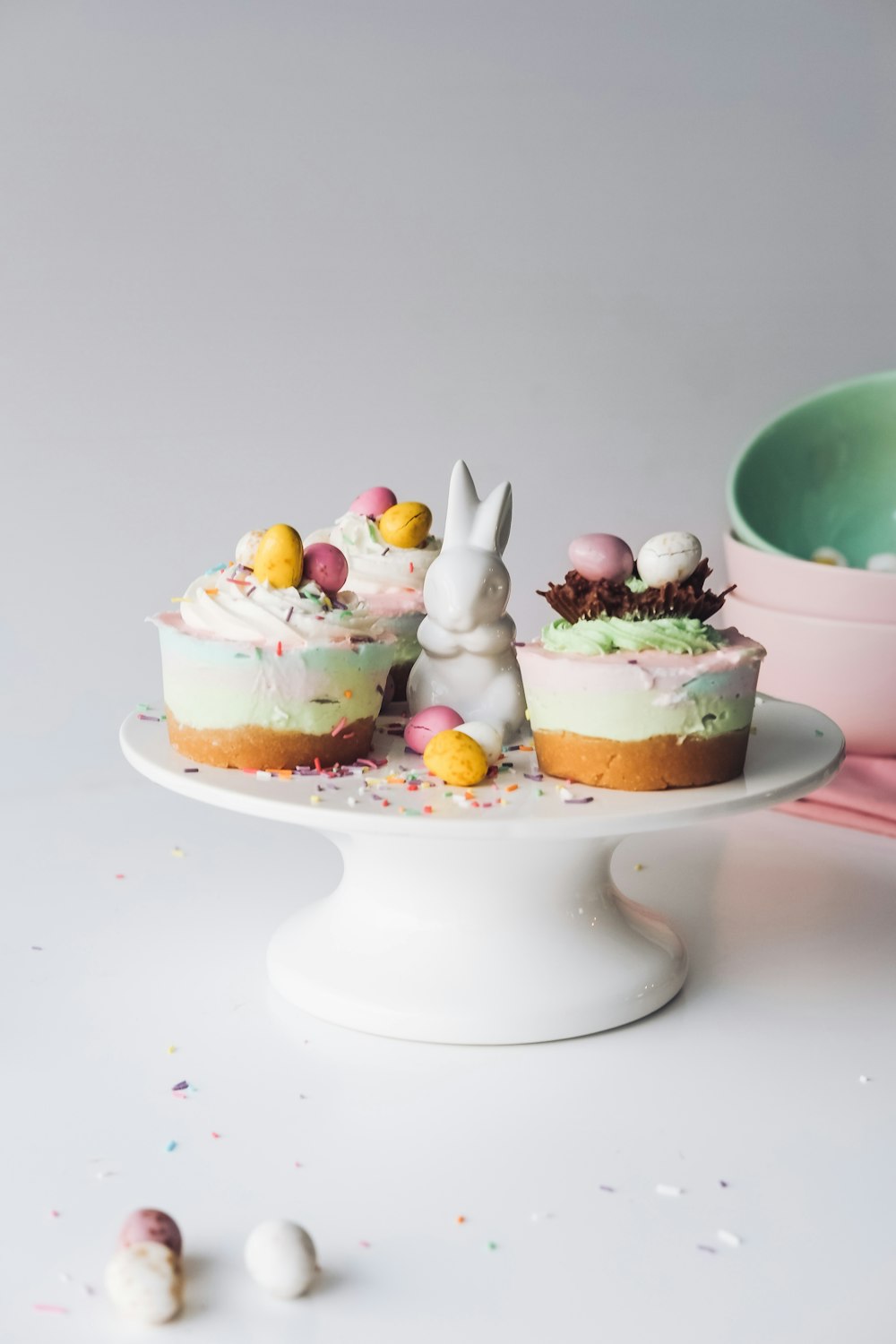 easter baking of cakes placed on white ceramic cake stand