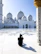 A joyful traveler capturing the moment in front of the Masjid al-Nabawi.