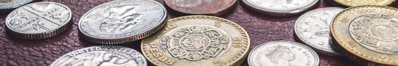 round gold-colored and silver-colored coin lot