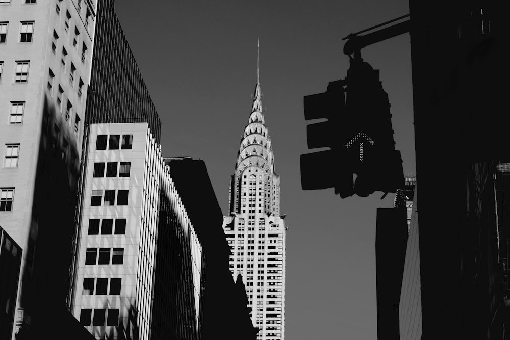 grayscale photography of high-rise buildings