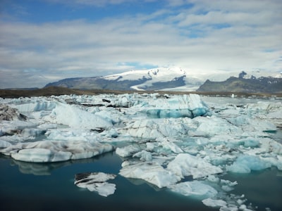 landscape photo of ice burgs frozen teams background