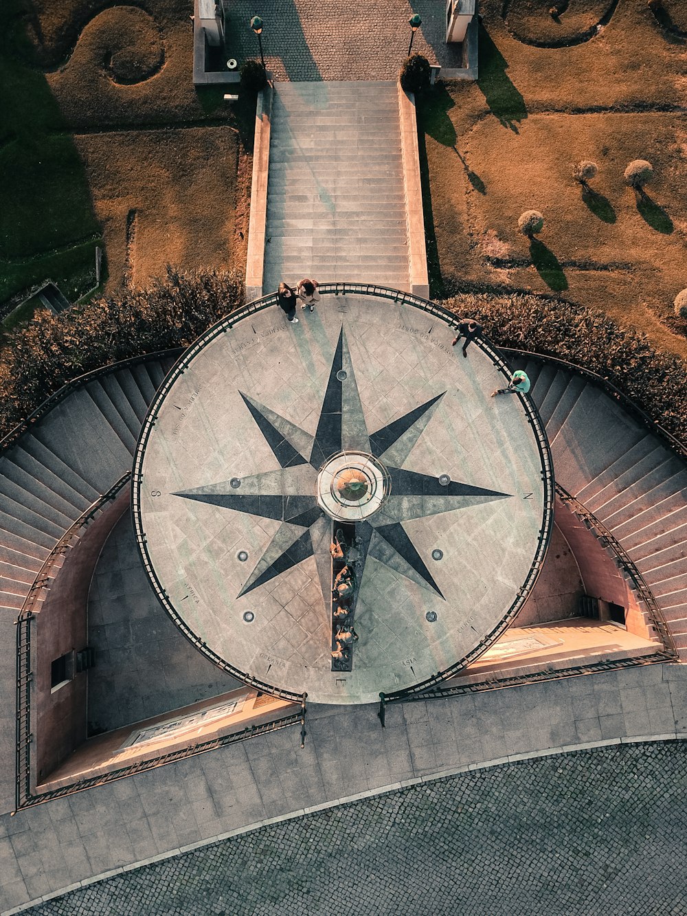 aerial photography of compass-themed terrace