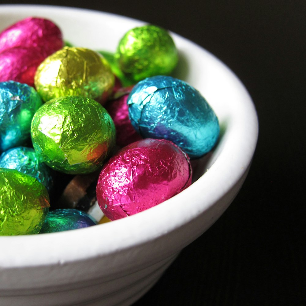 chocolate eggs in white bowl
