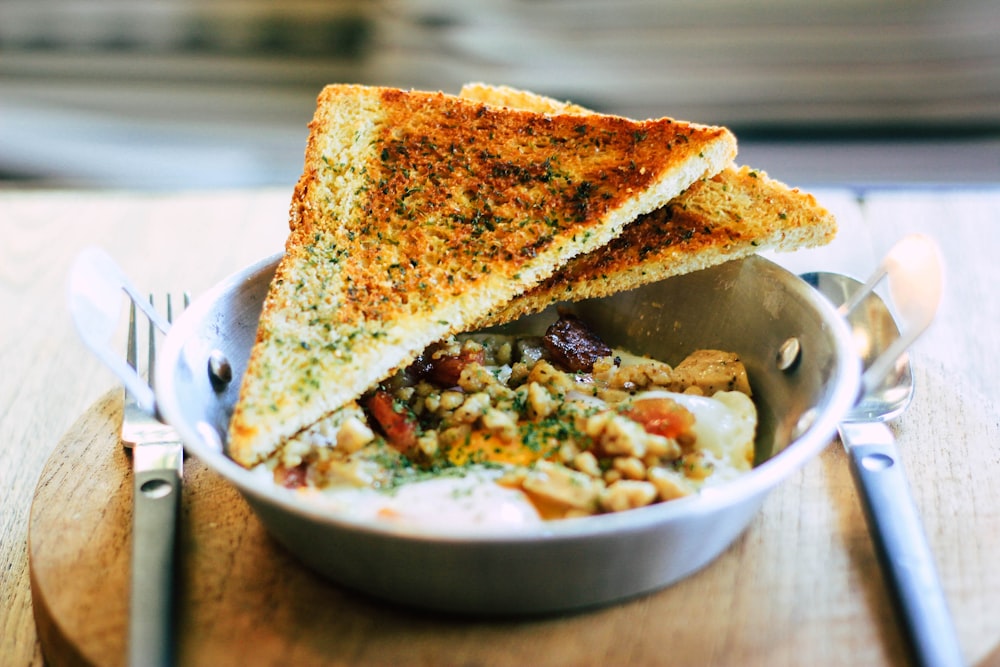 two sliced toast on gray bowl