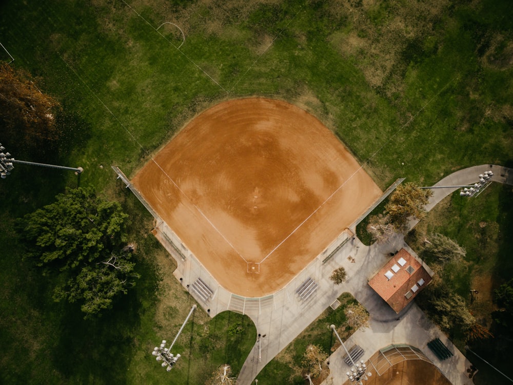 aerial photography of brown baseball field surrounded green field