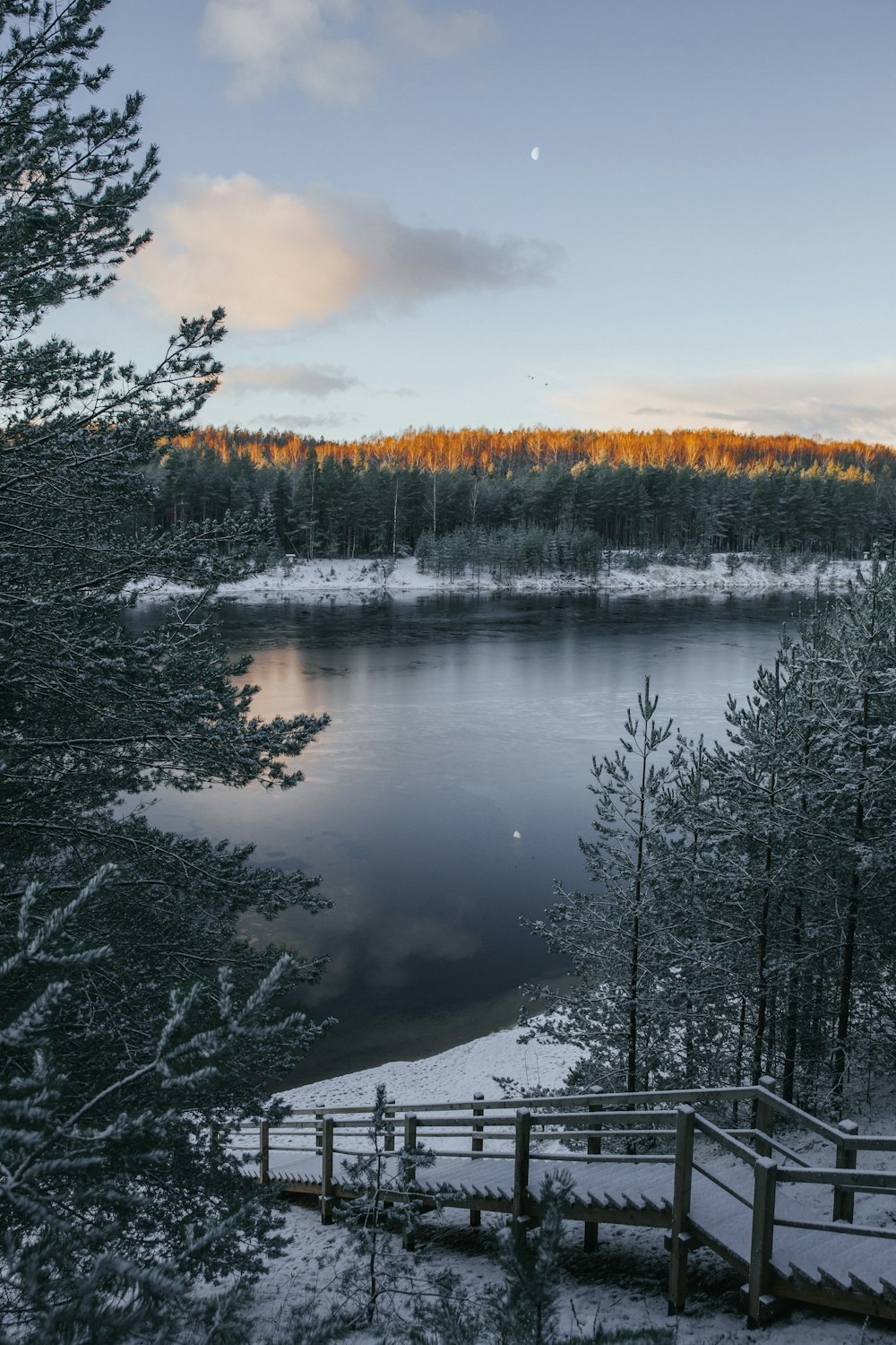 aerial view of body of water under blue sky