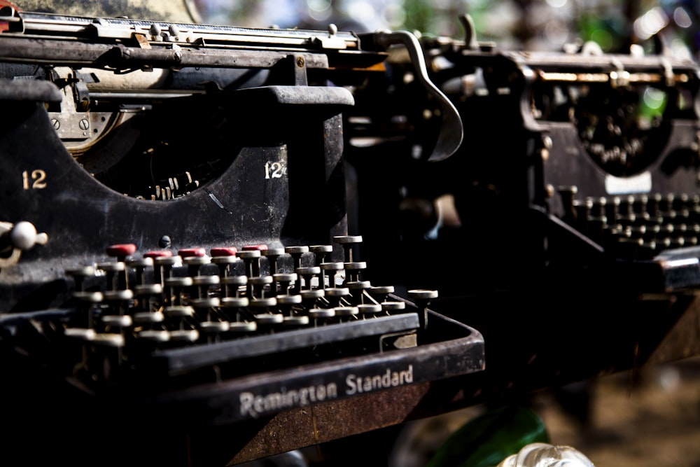 closeup photo of two typewriters