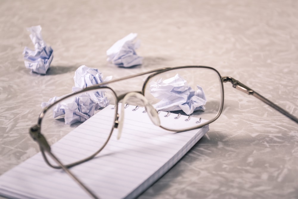 eyeglasses near on paper