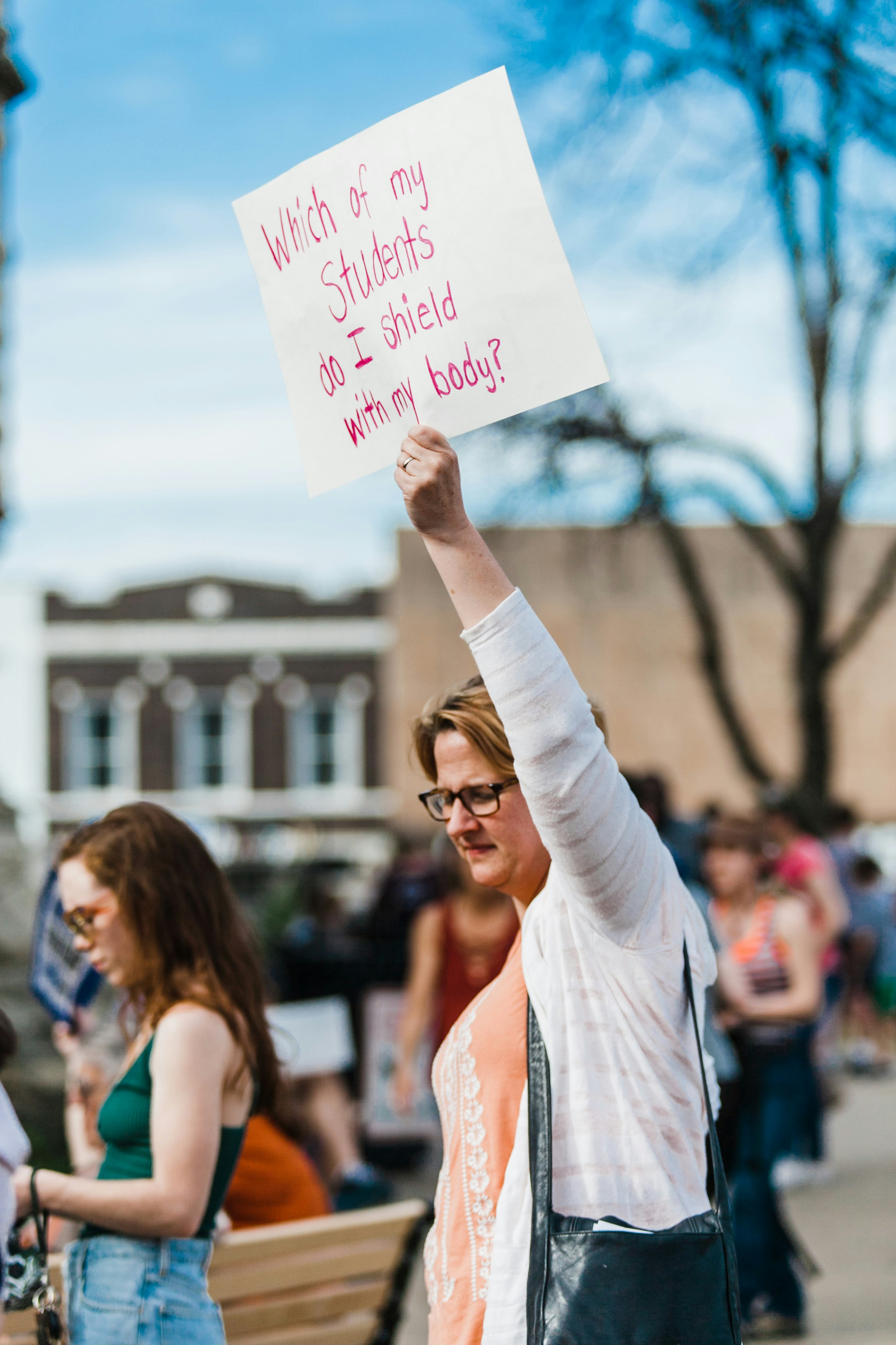 A North Texas teacher marching in the March for Our Lives rally held in Denton, Texas on March 24th, 2018.