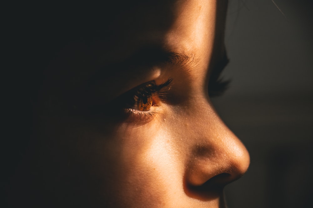 beam of light on person's face