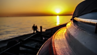 A cozy 60 hp boat docked under the golden sunset at the Ebro Delta