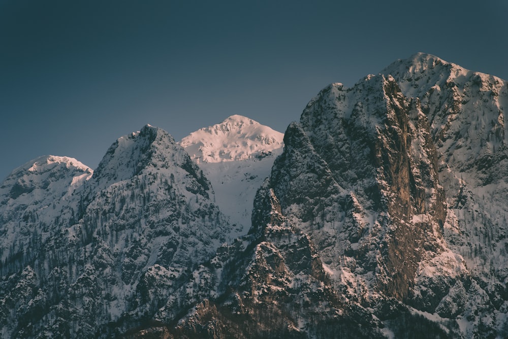 rock formation covered in snow