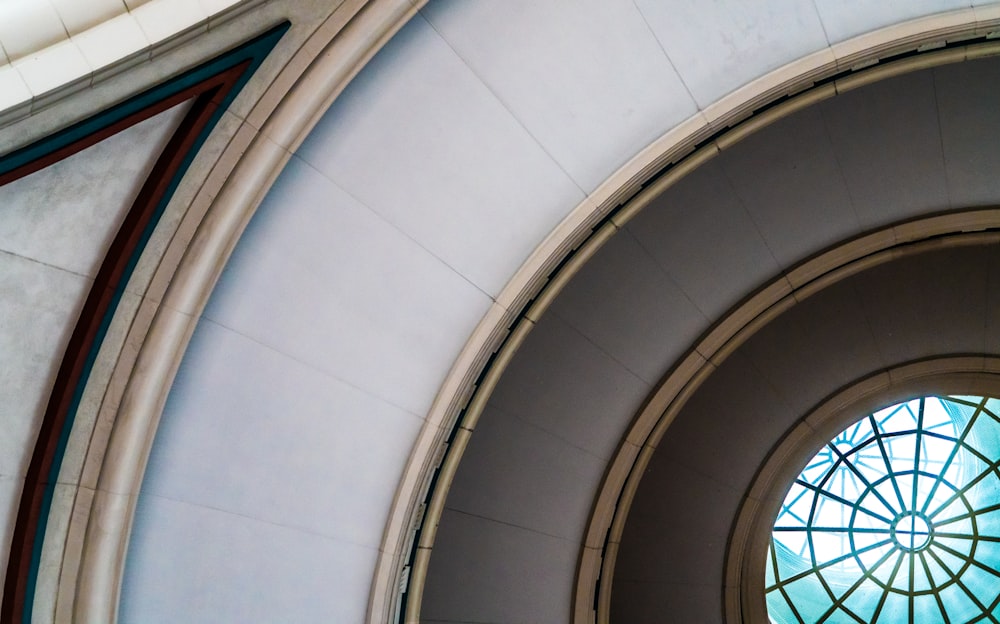 low angle photo of dome glass ceiling