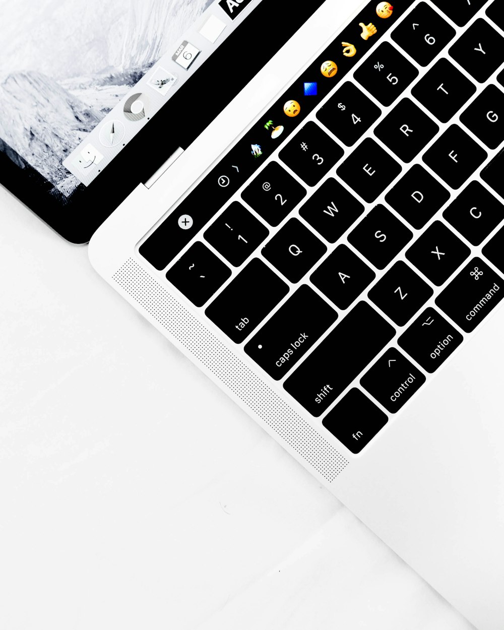 closeup photo of white and black laptop computer