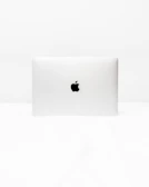 Customized laptop bags and sleeves subtly branded with logos, styled on a minimalist white background.