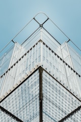 white high-rise building with blue sky