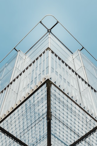 white high-rise building with blue sky