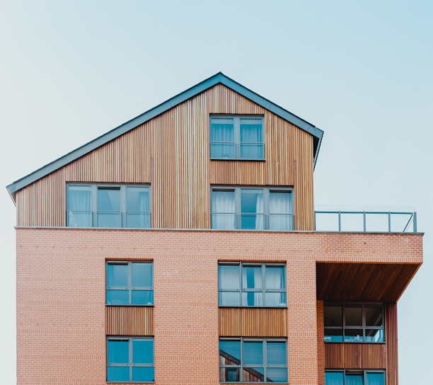 low-angle photo of brown house