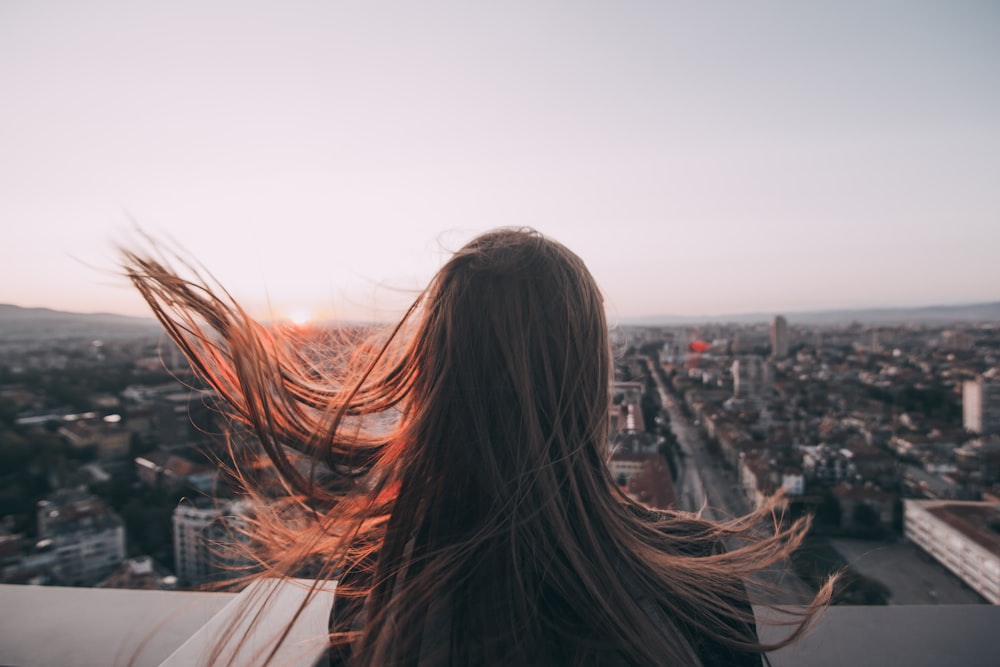 woman standing on rooftop