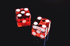 two red-and-white dices