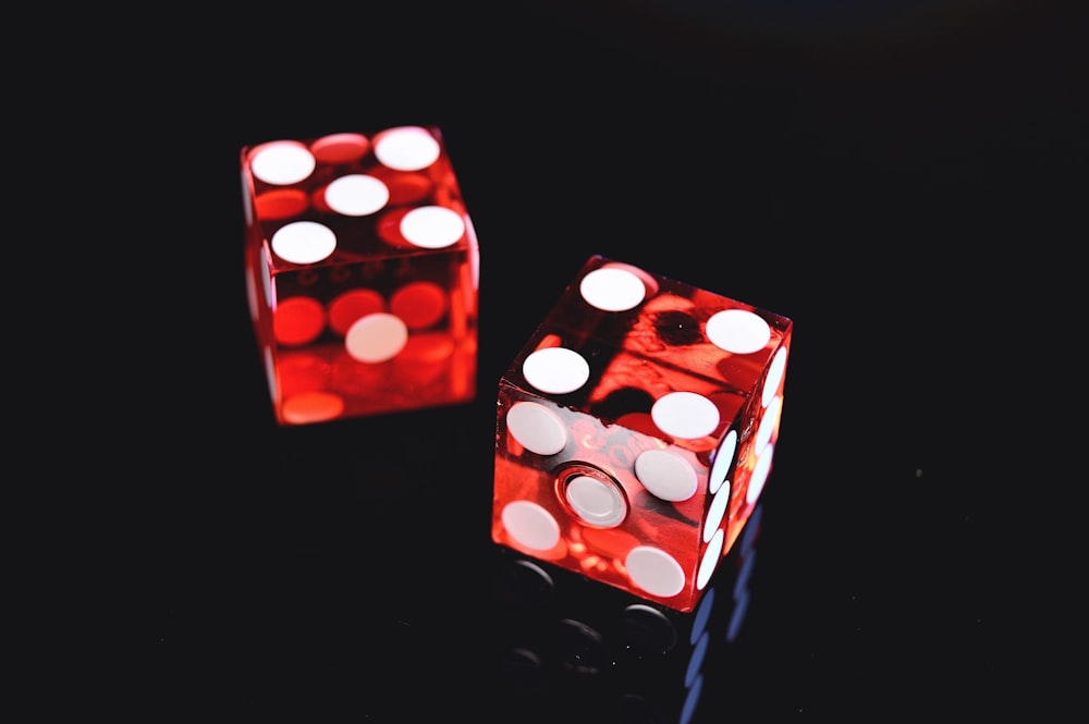 two red-and-white dices