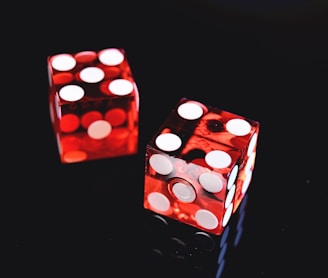 two red-and-white dices