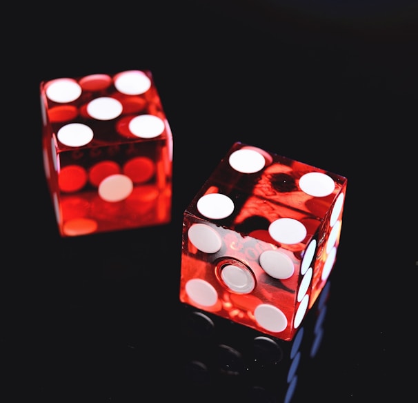 two red-and-white dices