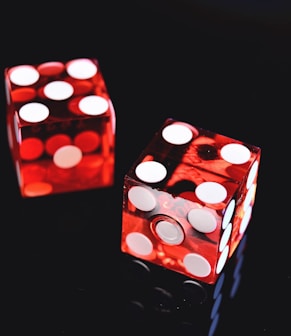 two red-and-white dices