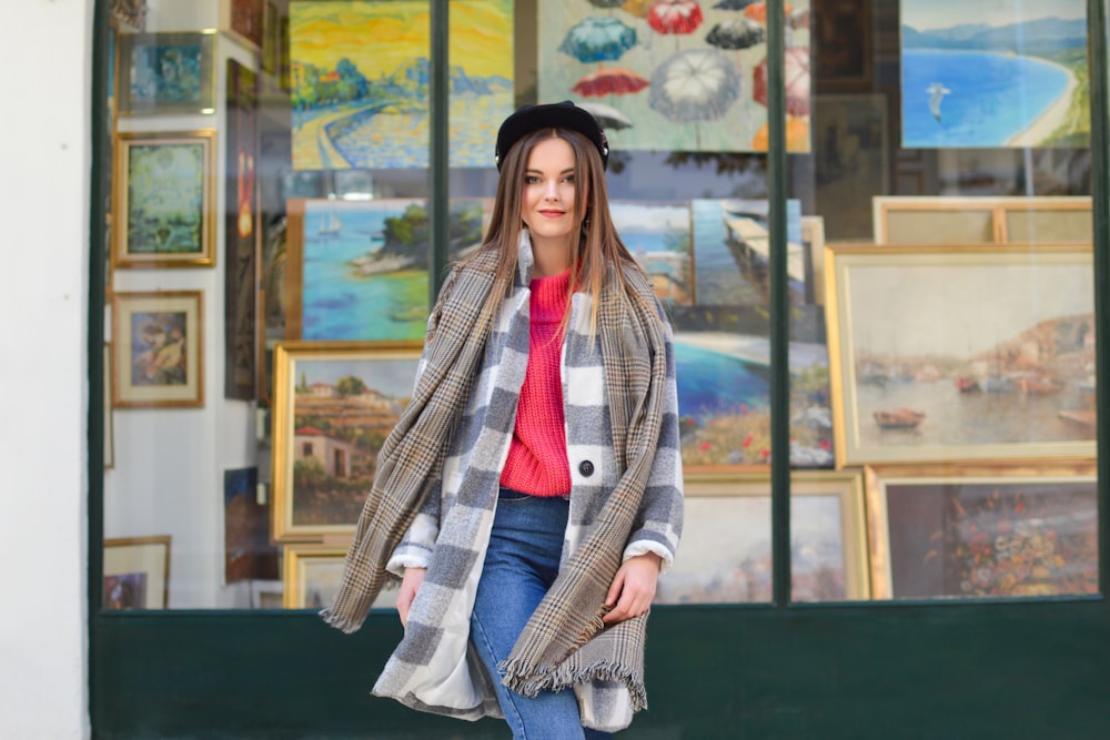 woman in gray and white cardigan