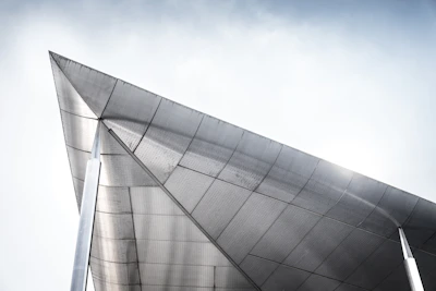 A sleek sheet roofing installation on a modern car shed, highlighting clean lines.