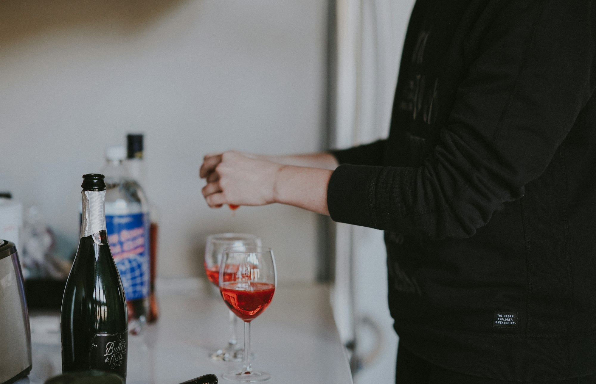 Woman making a cocktail