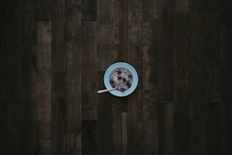a bowl of cereal on a wooden table