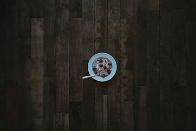 a bowl of cereal on a wooden table