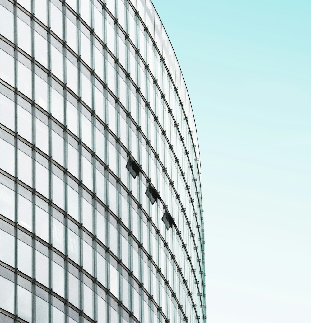 low-angle photography of building under clear blue sky